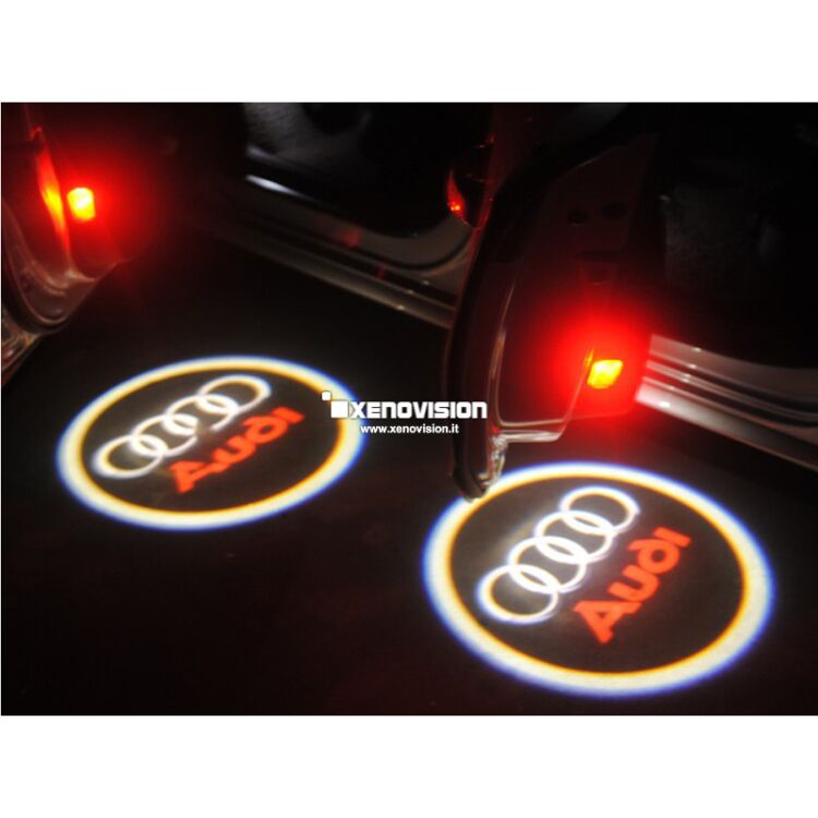 4 Kit Placche Led Sottoporta Proiettore Logo Audi - A3 A4 A5 A6 A8 R8 TT Q5 Q7 <p>Kit Placche Led Sottoporta/Pozzanghera con proiettore logo <strong>AUDI</strong></p>