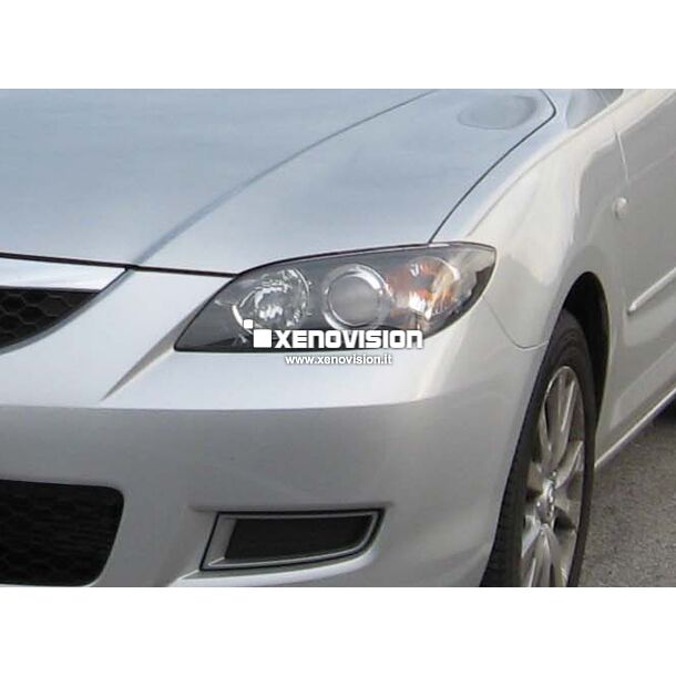 1 Kit Xenon Mazda 3 - 2003 a 2009 - Xenon 35W e Led Posizione - 6000k <p>Kit Xenon 35W specifico per il faro della Mazda 3 e Luci Posizione. Plug&Play zero spie, contiene tutto l'occorrente. Luce Bianco Lunare 6000k.</p>